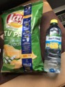 Onion flavored chips and lemon flavored water for the road